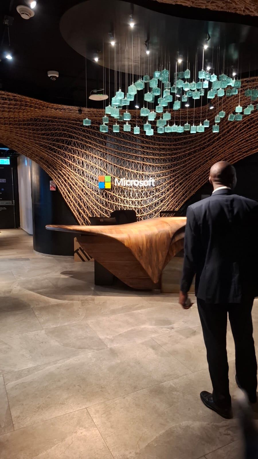 Microsoft office lobby in Nairobi with a woven wooden installation and the Microsoft logo